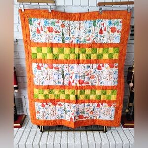 Vibrant Orange and Green Patchwork Quilt